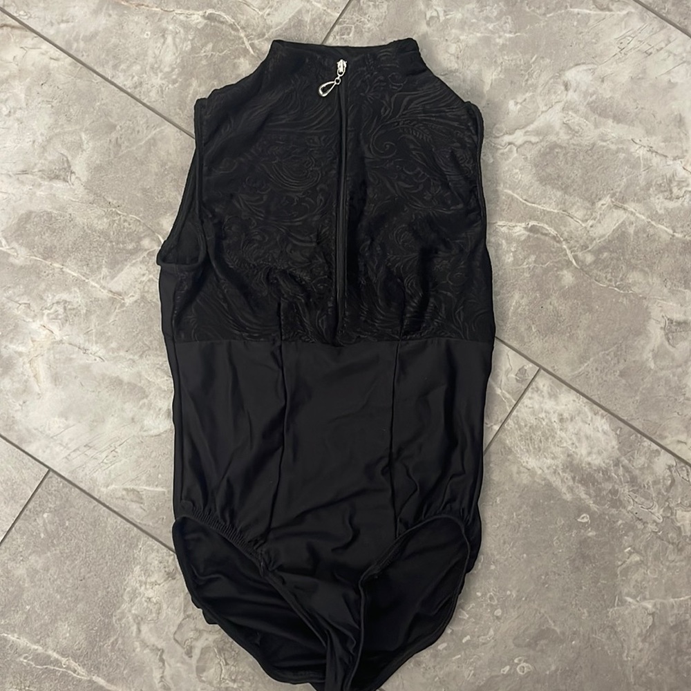 Black leotard with lined lace upper front and see through lace back.